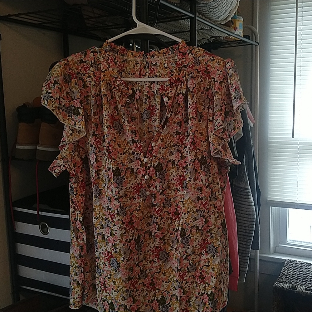 Shein XL nice and soft with ruffles along arms. Never worn